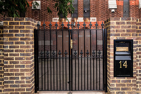 Steel gates with perforated sheet backing